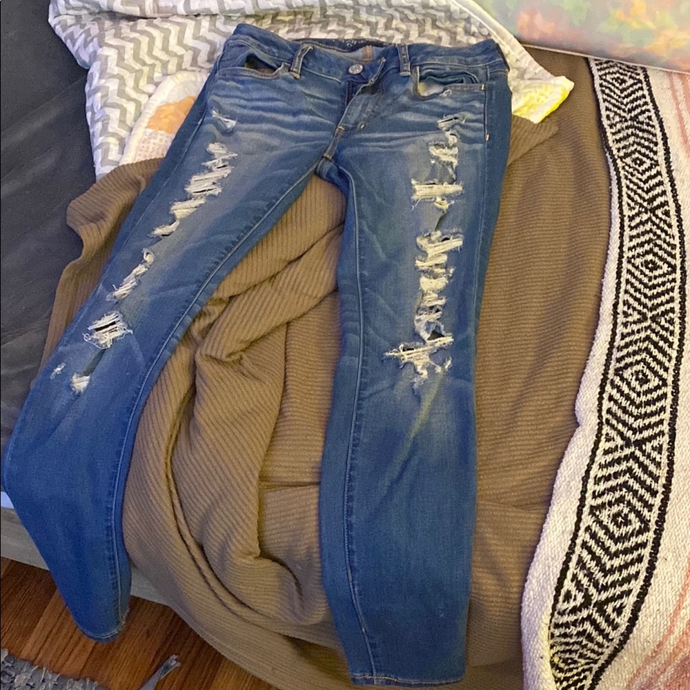 American Eagle Blue Jeggings with Distressed Design